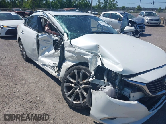 2016 Mazda Mazda6 i Grand Touring with VIN JM1GJ1W55G1443186, listed as a IAAI auction lot 42063716 with 114,263 mi miles. Bid and sale history available at carsss.com. Image 6.