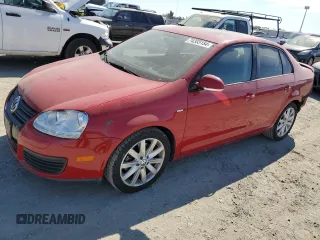 2010 Volkswagen Jetta Wolfsburg Edition with VIN 3VWRA7AJ3AM076327, listed as a Copart auction lot 74355154 with 42,747 mi miles and Salvage title. Bid and sale history available at DreamBid. Image 1.