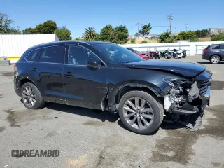 2020 Mazda CX-9 Grand Touring z VIN JM3TCADYXL0414926, wystawiony jako Copart lot #57528945 z przebiegiem 93 768 mil mil oraz Szkoda całkowita • Salvage title. Historia ofert i sprzedaży dostępna na DreamBid. Obrazek 4.