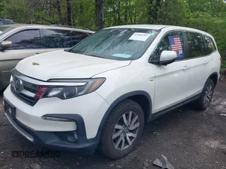 2019 Honda Pilot EX z VIN 5FNYF6H31KB086152, wystawiony jako IAAI lot #42204703 z przebiegiem 99 425 mil mil oraz . Historia ofert i sprzedaży dostępna na DreamBid. Obrazek 18.