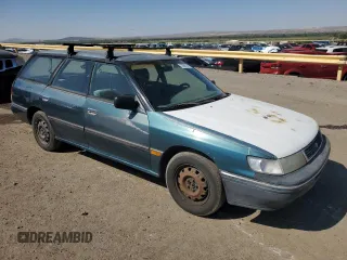 1994 Subaru Legacy L with VIN 4S3BJ6337R7955431, listed as a Copart auction lot 70200794 with 281,694 mi miles and Salvage Title. Bid and sale history available at DreamBid. Image 4.