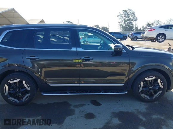 2023 Kia Telluride S with VIN 5XYP6DGC2PG387093, listed as a IAAI auction lot 42299026 with 12,895 mi miles and . Bid and sale history available at DreamBid. Image 13.
