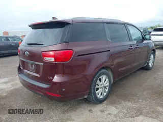 2016 Kia Sedona LX with VIN KNDMB5C10G6090643, listed as a IAAI auction lot 41911980 with 155,319 mi miles. Bid and sale history available at carsss.com. Image 4.