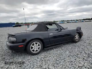 1994 Mazda MX-5 Miata with VIN JM1NA3534R0513305, listed as a Copart auction lot 52489865 with 150,481 mi miles and Salvage title. Bid and sale history available at DreamBid. Image 3.