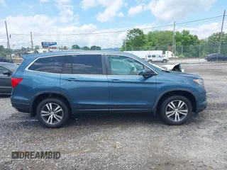 2018 Honda Pilot EX-L with VIN 5FNYF6H53JB006219, listed as a IAAI auction lot 42469399 with 134,214 mi miles and . Bid and sale history available at DreamBid. Image 13.