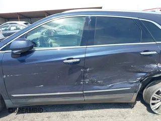 2019 Cadillac XT5 Luxury AWD z VIN 1GYKNDRSXKZ232989, wystawiony jako IAAI lot #42331092 z przebiegiem 54 100 mil mil oraz . Historia ofert i sprzedaży dostępna na DreamBid. Obrazek 14.