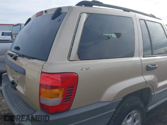 2000 Jeep Grand Cherokee Laredo with VIN 1J4GW48S4YC256978, listed as a IAAI auction lot 40652709 with 117,859 mi miles and . Bid and sale history available at DreamBid. Image 6.