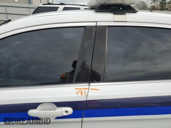 2013 Ford Police Interceptor with VIN 1FAHP2MT3DG196579, listed as a Copart auction lot 84094414 with Not provided miles and Salvage title. Bid and sale history available at DreamBid. Image 12.