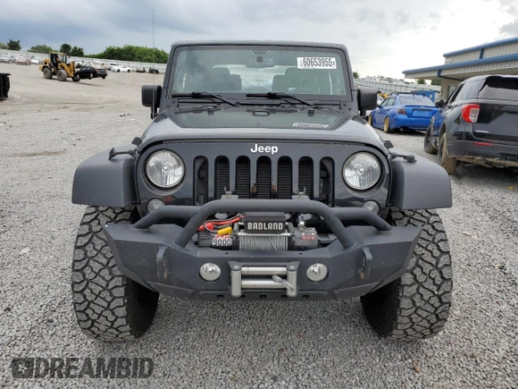 2014 Jeep Wrangler Sport with VIN 1C4AJWAG5EL326480, listed as a Copart auction lot 60653955 with 94,102 mi miles and Salvage title. Bid and sale history available at DreamBid. Image 5.