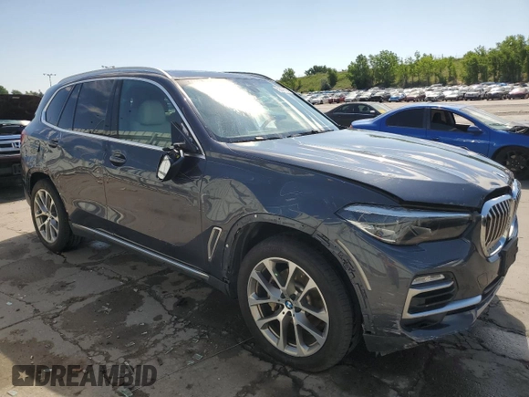 2020 BMW X5 xDrive40i with VIN 5UXCR6C06LLL75359, listed as a Copart auction lot 60897885 with 66,631 mi miles and Salvage title. Bid and sale history available at DreamBid. Image 4.