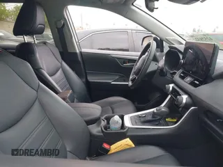 2023 Toyota RAV4 Hybrid XLE Premium with VIN 4T3B6RFV9PU117919, listed as a IAAI auction lot 42528322 with 27,236 mi miles and . Bid and sale history available at DreamBid. Image 5.