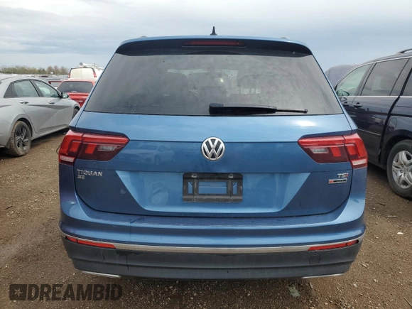 2018 Volkswagen Tiguan SEL z VIN 3VV2B7AX4JM076635, wystawiony jako Copart lot #54713815 z przebiegiem 162 692 mil mil oraz Szkoda całkowita • Salvage title. Historia ofert i sprzedaży dostępna na DreamBid. Obrazek 6.