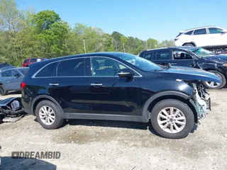2019 Kia Sorento L with VIN 5XYPG4A38KG574269, listed as a IAAI auction lot 42003610 with 129,896 mi miles and . Bid and sale history available at DreamBid. Image 14.