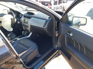 2009 Ford Focus SEL with VIN 1FAHP37N49W211350, listed as a IAAI auction lot 41641517 with 59,409 mi miles. Bid and sale history available at carsss.com. Image 5.