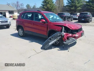 2015 Volkswagen Tiguan SE z VIN WVGBV7AX7FW056002, wystawiony jako IAAI lot #42122641 z przebiegiem 77 037 mil mil oraz . Historia ofert i sprzedaży dostępna na DreamBid. Obrazek 1.
