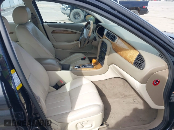 2003 Jaguar S-Type with VIN SAJEA01T93FM64497, listed as a IAAI auction lot 41804705 with 224,978 mi miles and . Bid and sale history available at DreamBid. Image 5.
