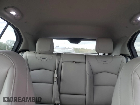 2021 Cadillac XT4 FWD Luxury с VIN 1GYAZAR44MF031416, выставлен на аукционе Copart как лот 82414724 с пробегом 60 392 миль миль и Списание • Salvage title. История ставок и продаж доступна на DreamBid. Изображение 10.