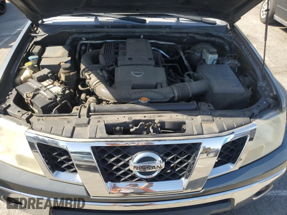 2009 Nissan Frontier LE with VIN 1N6AD09UX9C416211, listed as a Copart auction lot 61655315 with 344,390 mi miles and Salvage title. Bid and sale history available at DreamBid. Image 11.
