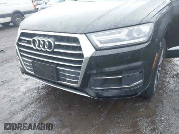 2019 Audi Q7 Premium with VIN WA1AHAF74KD029904, listed as a IAAI auction lot 41024012 with 79,896 mi miles and . Bid and sale history available at DreamBid. Image 6.