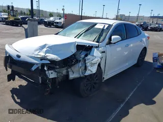 2018 Kia Optima LX with VIN 5XXGT4L37JG266313, listed as a IAAI auction lot 41662782 with Not Provided miles and . Bid and sale history available at carsss.com. Image 2.
