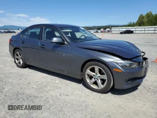2014 BMW 3 Series 320i with VIN WBA3B1C54EK132952, listed as a Copart auction lot 63653435 with 63,260 mi miles and Salvage title. Bid and sale history available at DreamBid. Image 4.