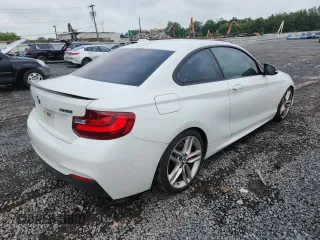 2015 BMW 2 Series 228i xDrive with VIN WBA1F7C56FVX95728, listed as a Copart auction lot 63245595 with 95,470 mi miles and Clean title. Bid and sale history available at DreamBid. Image 3.