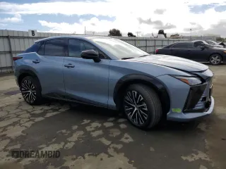 2023 Lexus RZ with VIN JTJAAAAB8PA005620, listed as a Copart auction lot 49634825 with 26,553 mi miles and Salvage Title. Bid and sale history available at carsss.com. Image 4.