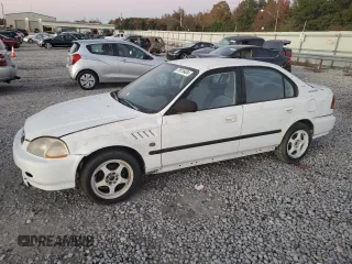 1997 Honda Civic DX with VIN 2HGEJ6626VH532081, listed as a Copart auction lot 79816404 with 320,923 mi miles and Clean Title. Bid and sale history available at carsss.com. Image 1.