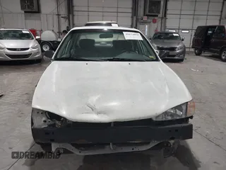 2000 Chevrolet Prizm LSi z VIN 1Y1SK528XYZ430060, wystawiony jako IAAI lot #41173059 z przebiegiem 96 086 mil mil oraz . Historia ofert i sprzedaży dostępna na DreamBid. Obrazek 13.