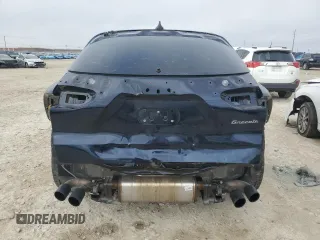 2023 Maserati Grecale Modena z VIN ZN682AVM1P7407775, wystawiony jako Copart lot #88538195 z przebiegiem 22 543 mil mil oraz Szkoda całkowita • Salvage title. Historia ofert i sprzedaży dostępna na DreamBid. Obrazek 6.