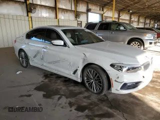2018 BMW 5 Series 530e with VIN WBAJA9C53JG622997, listed as a Copart auction lot 79959024 with 127,486 mi miles and Salvage title. Bid and sale history available at DreamBid. Image 4.