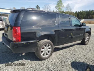2013 GMC Yukon XL SLT z VIN 1GKS2KE77DR301715, wystawiony jako Copart lot #51524415 z przebiegiem 168 247 mil mil oraz Szkoda całkowita • Salvage title. Historia ofert i sprzedaży dostępna na DreamBid. Obrazek 3.