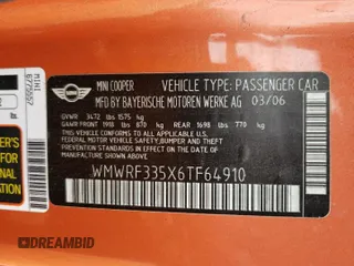2006 MINI Convertible with VIN WMWRF335X6TF64910, listed as a Copart auction lot 60222215 with 85,761 mi miles and Salvage title. Bid and sale history available at DreamBid. Image 12.