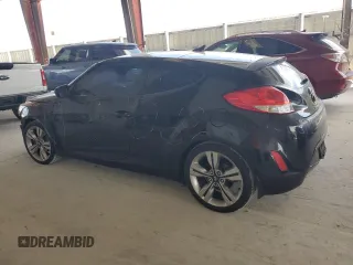 2013 Hyundai Veloster w/Gray Int z VIN KMHTC6AD8DU163465, wystawiony jako Copart lot #60276915 z przebiegiem 124 451 mil mil oraz Szkoda całkowita • Salvage title. Historia ofert i sprzedaży dostępna na DreamBid. Obrazek 2.