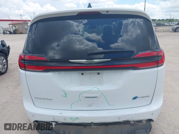 2023 Chrysler Pacifica Hybrid Touring L with VIN 2C4RC1L71PR622474, listed as a IAAI auction lot 42595061 with 55,880 mi miles and . Bid and sale history available at DreamBid. Image 16.