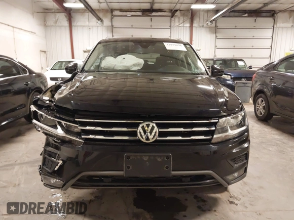 2021 Volkswagen Tiguan SE with VIN 3VV2B7AXXMM034880, listed as a IAAI auction lot 41979636 with 34,490 mi miles and . Bid and sale history available at DreamBid. Image 13.