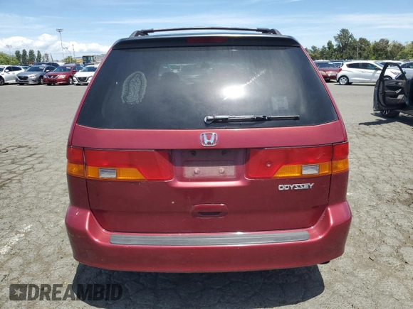 2004 Honda Odyssey EX-L with VIN 5FNRL18014B031578, listed as a Copart auction lot 56938795 with 241,085 mi miles and Salvage title. Bid and sale history available at DreamBid. Image 6.
