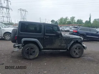 2007 Jeep Wrangler Rubicon with VIN 1J4GA64117L149666, listed as a IAAI auction lot 42252464 with 100,791 mi miles and . Bid and sale history available at DreamBid. Image 13.