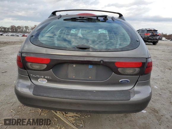 2002 Ford Taurus with VIN 1FAFP59S62A256119, listed as a Copart auction lot 79581164 with 57,128 mi miles and Clean title. Bid and sale history available at DreamBid. Image 6.