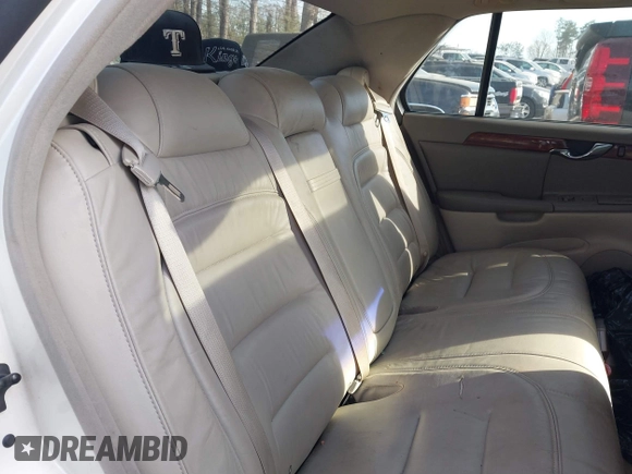2002 Cadillac DeVille z VIN 1G6KD54Y72U218221, wystawiony jako IAAI lot #41842554 z przebiegiem 117 430 mil mil oraz . Historia ofert i sprzedaży dostępna na DreamBid. Obrazek 8.