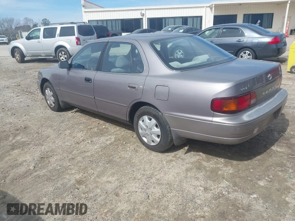 1996 Toyota Camry DX with VIN 4T1BG12K8TU762073, listed as a IAAI auction lot 41606136 with 254,939 mi miles. Bid and sale history available at carsss.com. Image 3.