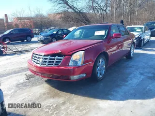 2006 Cadillac DTS w/1SC with VIN 1G6KD57Y06U210141, listed as a IAAI auction lot 41406256 with 184,569 mi miles. Bid and sale history available at carsss.com. Image 2.