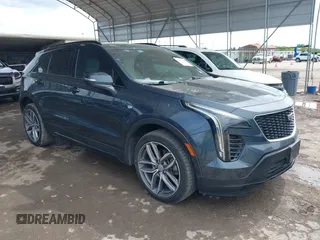 2019 Cadillac XT4 FWD Sport z VIN 1GYFZER49KF215843, wystawiony jako IAAI lot #41912861 z przebiegiem 102 922 mil mil oraz . Historia ofert i sprzedaży dostępna na DreamBid. Obrazek 1.