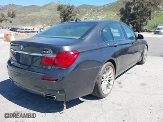 2013 BMW 7 Series 750i with VIN WBAYA8C50DD227951, listed as a IAAI auction lot 41842264 with 157,438 mi miles. Bid and sale history available at carsss.com. Image 4.