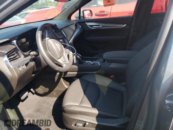 2023 Cadillac XT5 FWD Luxury z VIN 1GYKNAR4XPZ144533, wystawiony jako Copart lot #74734164 z przebiegiem Nie podano mil oraz Nie do naprawy • Non repairable. Historia ofert i sprzedaży dostępna na DreamBid. Obrazek 7.