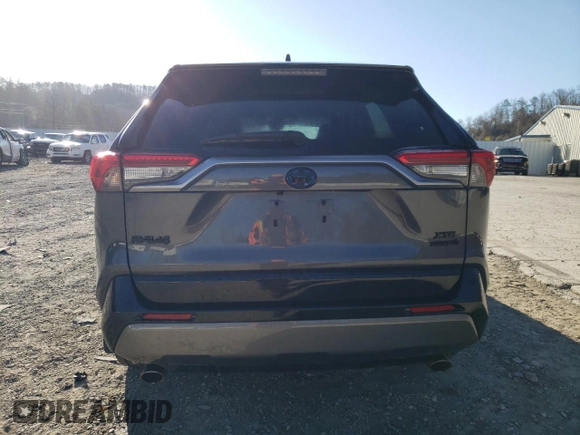 2021 Toyota RAV4 Hybrid XSE with VIN 2T3E6RFV8MW027802, listed as a Copart auction lot 49226415 with Not provided miles and Salvage title. Bid and sale history available at DreamBid. Image 6.