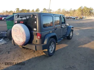 2018 Jeep Wrangler JK Unlimited Sport with VIN 1C4BJWDG2JL810424, listed as a IAAI auction lot 41610669 with 73,830 mi miles. Bid and sale history available at carsss.com. Image 4.