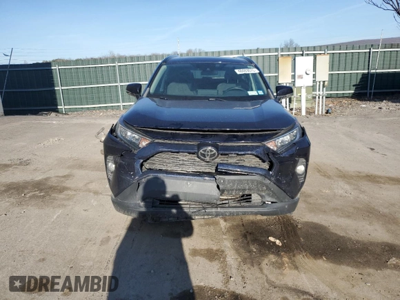 2019 Toyota RAV4 XLE with VIN 2T3P1RFV5KW055822, listed as a Copart auction lot 48483075 with 60,619 mi miles and Salvage Title. Bid and sale history available at DreamBid. Image 5.