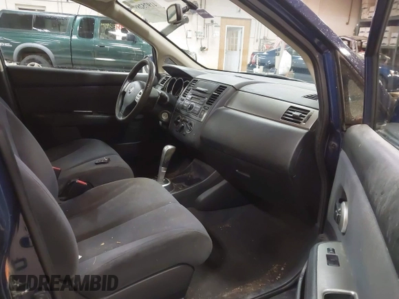 2009 Nissan Versa 1.8 S with VIN 3N1BC11E79L440560, listed as a IAAI auction lot 41975289 with 158,726 mi miles. Bid and sale history available at carsss.com. Image 5.