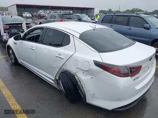 2014 Kia Optima Hybrid LX with VIN KNAGM4AD8E5067173, listed as a IAAI auction lot 41937734 with 121,209 mi miles. Bid and sale history available at carsss.com. Image 3.